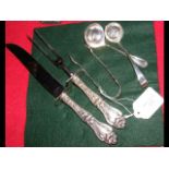 Silver sugar tongs, sifter spoon, carving set