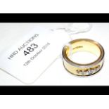 An 18ct gold diamond ring - 14.4g