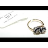 A 9ct gold crossover ring - Size M