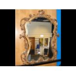 Decorative gilt framed wall mirror