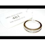 An 18ct gold half hoop diamond eternity ring