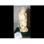 Carved ivory Chinese figure - man holding basket -