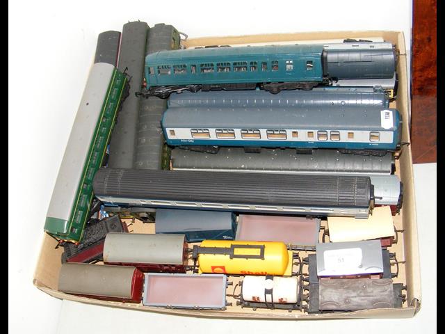 Selection of unboxed train carriages and rolling s