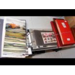 Five albums containing stamps, cigarette cards, po