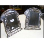 A pair of silver Art Nouveau style photo frames -