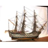 A wooden model of HMS Victory with full rigging -