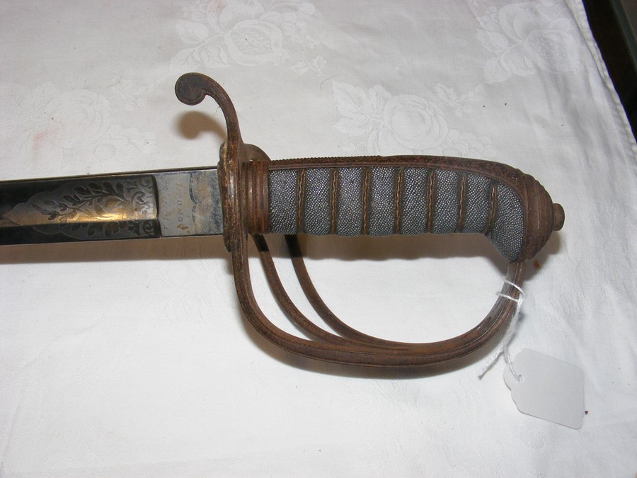 An old Officer's sword with engraved blade and met - Image 3 of 12