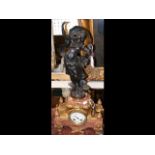 A 60cm high French style mantel clock with female