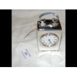 A small silver carriage clock - 7cm high