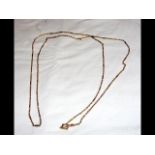 An 18ct gold 75cm long guard chain - 46g