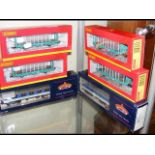 Four boxed Hornby wagons, together with two boxed