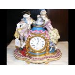 A French ceramic and gilt mantel clock - 30cm high