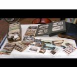 Two vintage postcard albums, together with 500 Bri