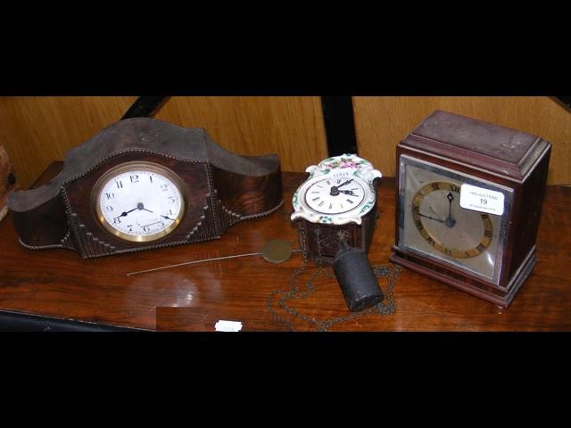 Two mantel clocks, together with a miniature hangi