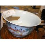 An antique oriental bowl with hand painted decorat