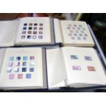 Four albums containing collectable stamps - Channe