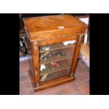 A miniature Victorian walnut pier cabinet with gil