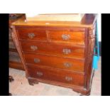 Antique style mahogany chest of two short and thre