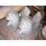 A pair of 2ft long concrete garden Lion ornaments