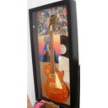 A six string guitar signed by The Police - with Ce