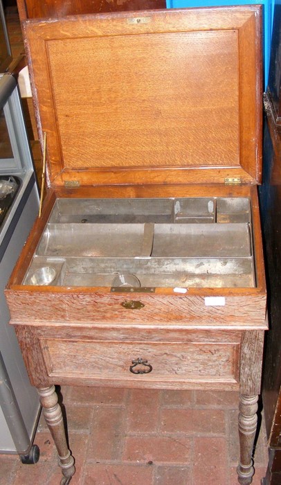 An old oak Artist's table with fitted metal interi