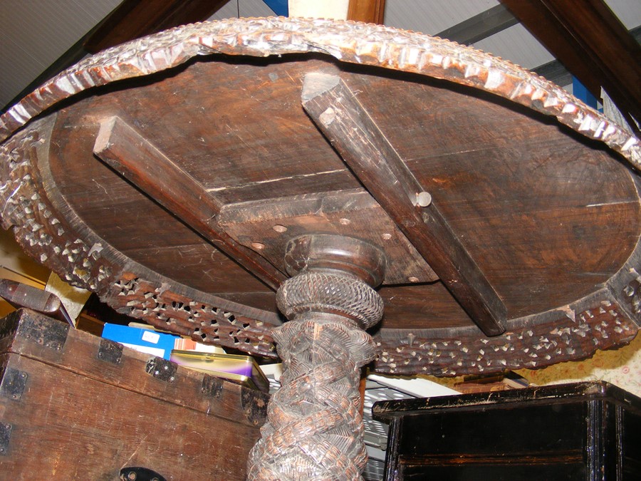A heavily carved Anglo Indian tilt-top table with - Image 10 of 14