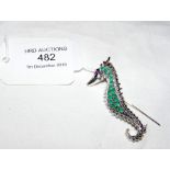 A silver "Seahorse" brooch with emerald and ruby m