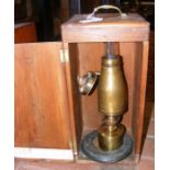 Antique microscope illuminator in carrying case