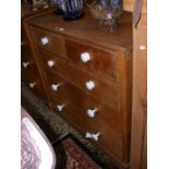 An antique pine chest of drawers