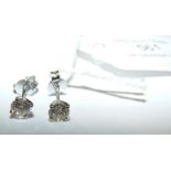 A pair of 18ct white gold diamond stud earrings -
