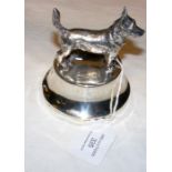 A silver dog ornament - 10cm high