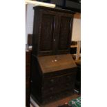 Antique carved oak bureau bookcase