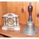 An old hand bell, together with mantel clock