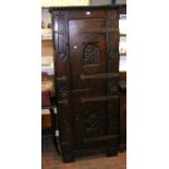 An antique style continental oak hall cupboard, wi