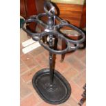 A cast metal stick/umbrella stand