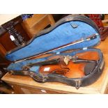Antique violin and bow in carrying case