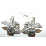 A pair of 18ct white gold floral diamond cluster s