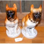 A pair of 21cm high ceramic USSR dog ornaments