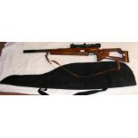 A German air rifle with scope and carrying bag