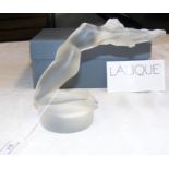 A Lalique reclining nude - in original box - 14cm