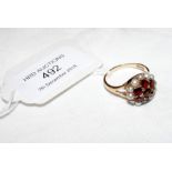 A 9ct gold garnet and pearl ring