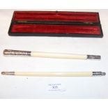 A silver mounted and ivory Conductor's baton in pr