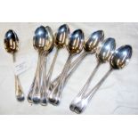 The matching set of twelve silver dessert spoons -