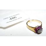 An 18ct gold ruby and diamond ring