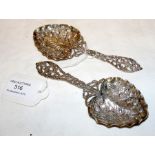 A pair of pierced silver presentation spoons by J