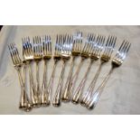 A set of twelve heavy silver dining forks with Lon