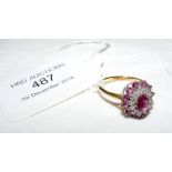 A ruby and diamond ring in 18ct gold setting