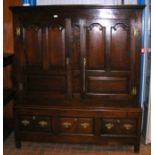 A period oak cupboard with three drawers below - 1