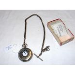 A silver half hunter pocket watch and chain