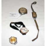 A silver wrist watch, together with others